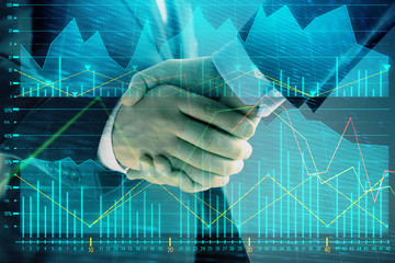 Multi exposure of forex graph on abstract background with two businessmen handshake. Concept of success on stock market