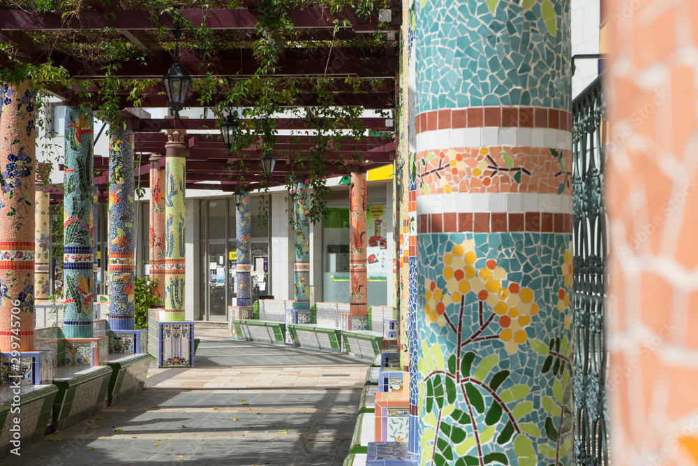 Hispanic Path Design Classical tiled artistic spanish corridor with column in garden square ...