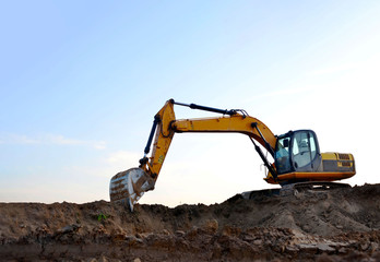 Poster - Excavator digs the ground for the foundation and construction of a new building. Road repair, asphalt replacement, renovating a section of a highway, laying or replacement of underground sewer pipes