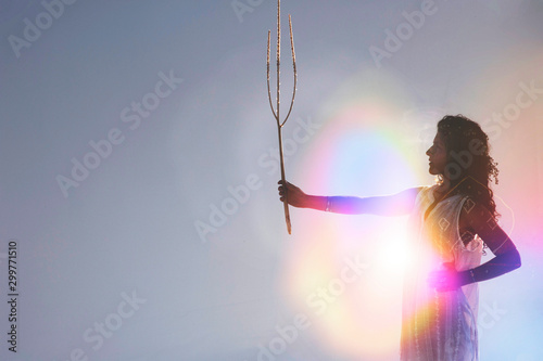Cuadros en Lienzo Spiritual woman holding an organic plant branch like a scepter