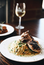 Roasted Chicken And Pasta Served On Plate