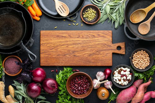 Fotografía Dark culinary background with healthy food ingredients