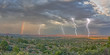 © robertharding - Lightning storm with rainbow over Mingus Mountain