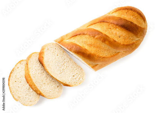 Fotografía Loaf of bread cut into pieces on a white. The view of the top.
