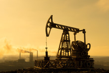 Oil Pump On The Background Of Sunset And Pipes Of The Plant. Oil Production, Natural Resources, Fuel