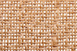 Wicker twigs texture isolated. Close-up of a detail of a handmade wicker lamp shade isolated on a white background. Macro.