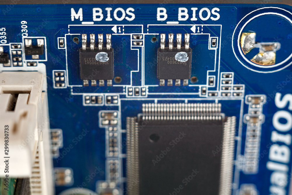 BIOS chips close-up macro on the motherboard of the computer, the ...