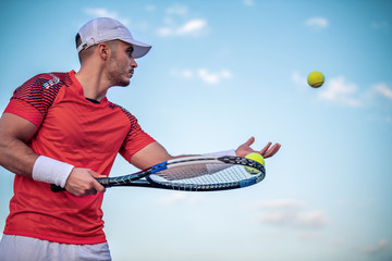 Young man playing tennis