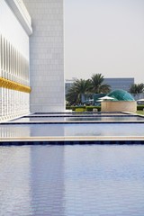 Wall Mural - cascade of water pools around sheikh zayed mosque