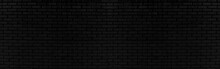 Abstract Black Brick Wall Texture For Background Or Wallpaper Design. Panorama Picture.