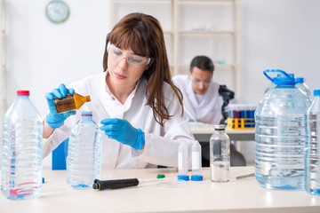 two chemists working in the lab