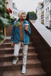 © Yakobchuk Olena - Charming old lady is looking away outside
