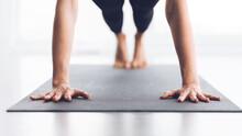 Slim Woman Practicing Yoga In Plank Pose, Closeup