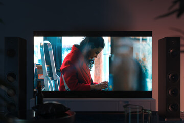 Big black tv set with film shot on white cupboard in modern interior, 3d rendering. Front view.