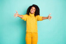 Photo Of Amazing Dark Skin Lady With Open Arms Waiting Best Friend Coming For Hugging Wear Yellow Knitted Pullover Trousers Isolated Blue Teal Color Background