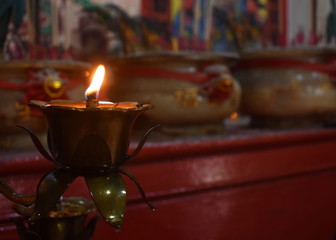 Sticker - Oil candle burning inside a Chinese temple