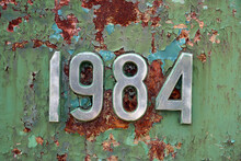Vintage Metal Background With Rust And Number 1984