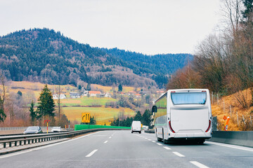 Canvas Print - White touristic bus in road