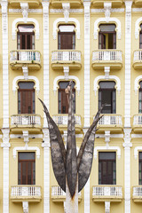 Wall Mural - sculpture in front of building, havana - cuba