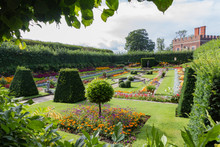 Hampton Court Palace Sunken Gardens Framed By Green Bushes Seen With William III Banqueting House Of 1700 In Background