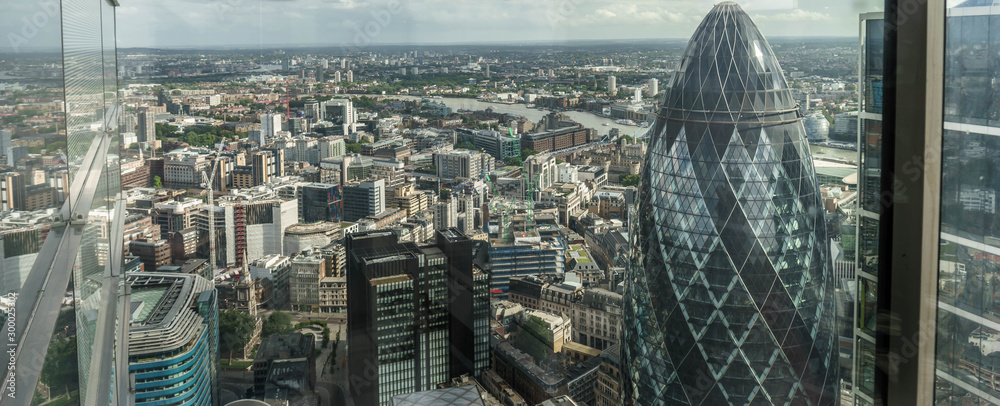 The tip of London's iconic Gherkin building from up high. London - obrazy, fototapety, plakaty 