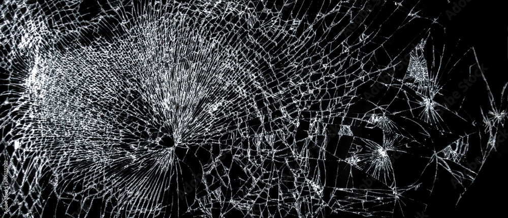 Broken phone screen, large cracked glass on a black background - obrazy, fototapety, plakaty 