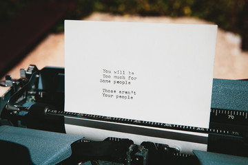 Inspirational sentences typed on a vintage typewriter, be yourself concept