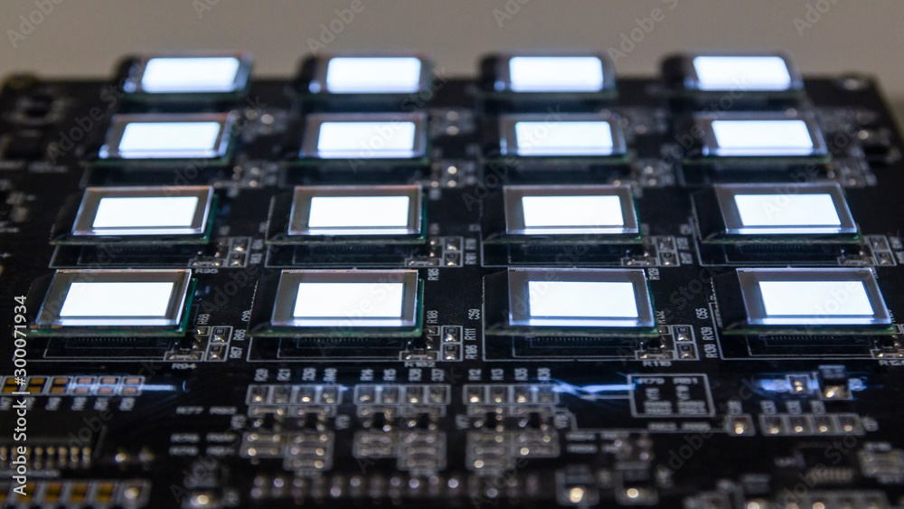 The process of checking several oled displays of white color on the ...