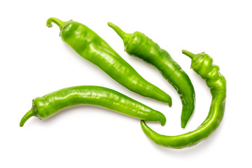 Wall Mural - green peppers isolated on white background