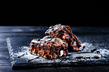 dessert ice cream ball and chocolate slice of cake