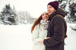 © Studio Romantic - Young couple on the snow in winter in the park