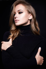 Wall Mural - portrait of beautiful young woman in black