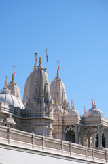 Canvas Print - View of a white marble hindu temple