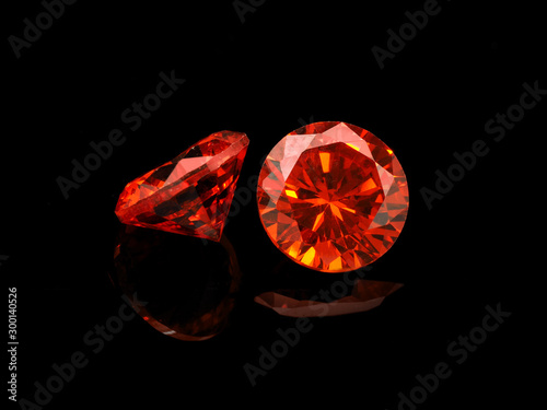 Cuadros en Lienzo Light Red Gemstone on a Black Background