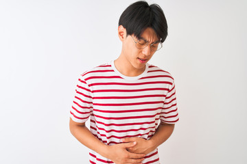 Sticker - Young chinese man wearing glasses and striped t-shirt standing over isolated white background with hand on stomach because indigestion, painful illness feeling unwell. Ache concept.