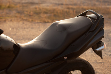 Wall Mural - One black motorcycle in the desert.