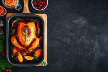 Christmas Roasted Chicken Or Turkey With Spices, Oranges And Cranberries