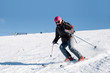 © belyaaa - Young skier woman posing for the camera on french slopes