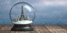 Eiffel Tower In The Snow Globe Glass Ball. Travel Or Trip To Paris And France In Winter For Celebrate Christmas.