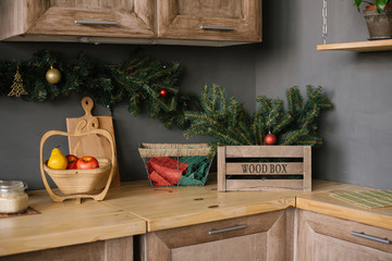 Kitchen utensils and accessories in the kitchen, decorated for Christmas and New Year