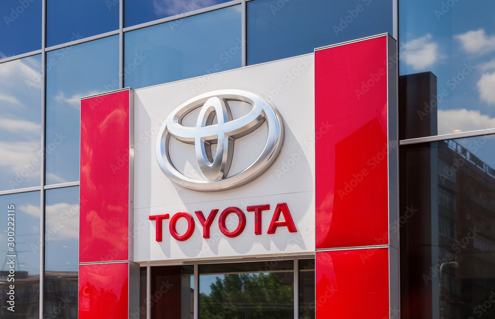 The emblem Toyota on the office of official dealer. Toyota Motor Corporation is a Japanese automotive manufacturer headquartered in Toyota, Aichi, Japan