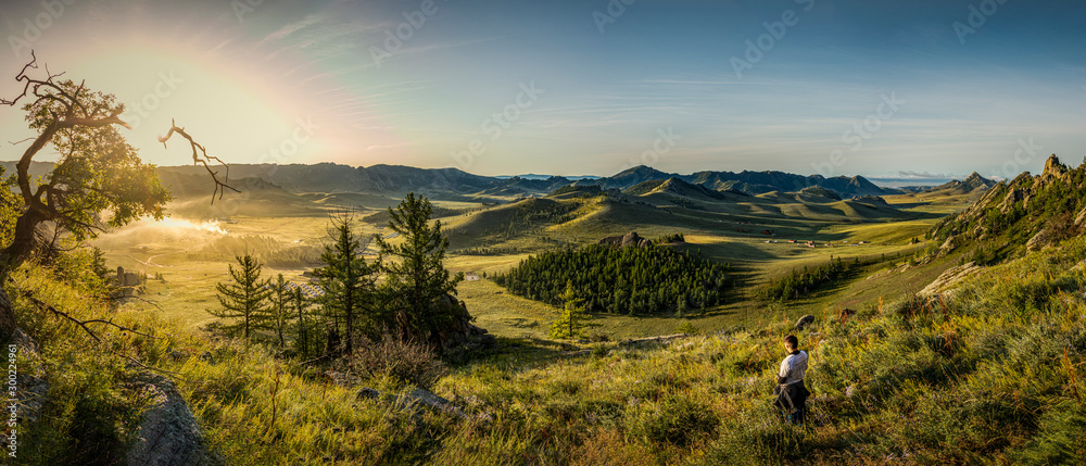 Gorkhi Terelj National Park Sunrise in Mongolia, with a campsite in the valley - Panorama - obrazy, fototapety, plakaty 