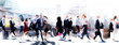 canvas print picture - Walking people blur. Lots of people walking in the City of London. Wide panoramic view of people crossing the road. 