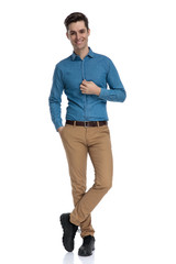 Sticker - happy smart casual man arranging shirt and smiling