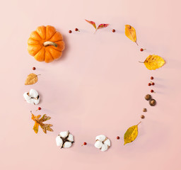 Wall Mural - autumn theme with orange pumpkin - flat lay