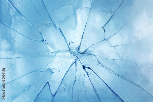 Fotografía Closeup of a cracked ice texture. Studio macro shot.