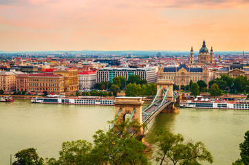 famous chain bridge and saint stephen basilica in budapest, hungary