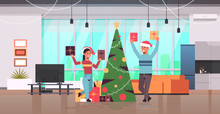 Couple Holding Wrapped Gift Present Boxes Merry Christmas Happy New Year Holiday Celebration Concept Man Woman Wearing Santa Hats Modern Living Room Interior Flat Full Length Horizontal Vector