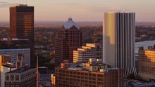 Rochester New York Aerial V31 Slow Panning View Of Close Up Downtown Skyline With River In Backdrop At Sunrise - October 2017