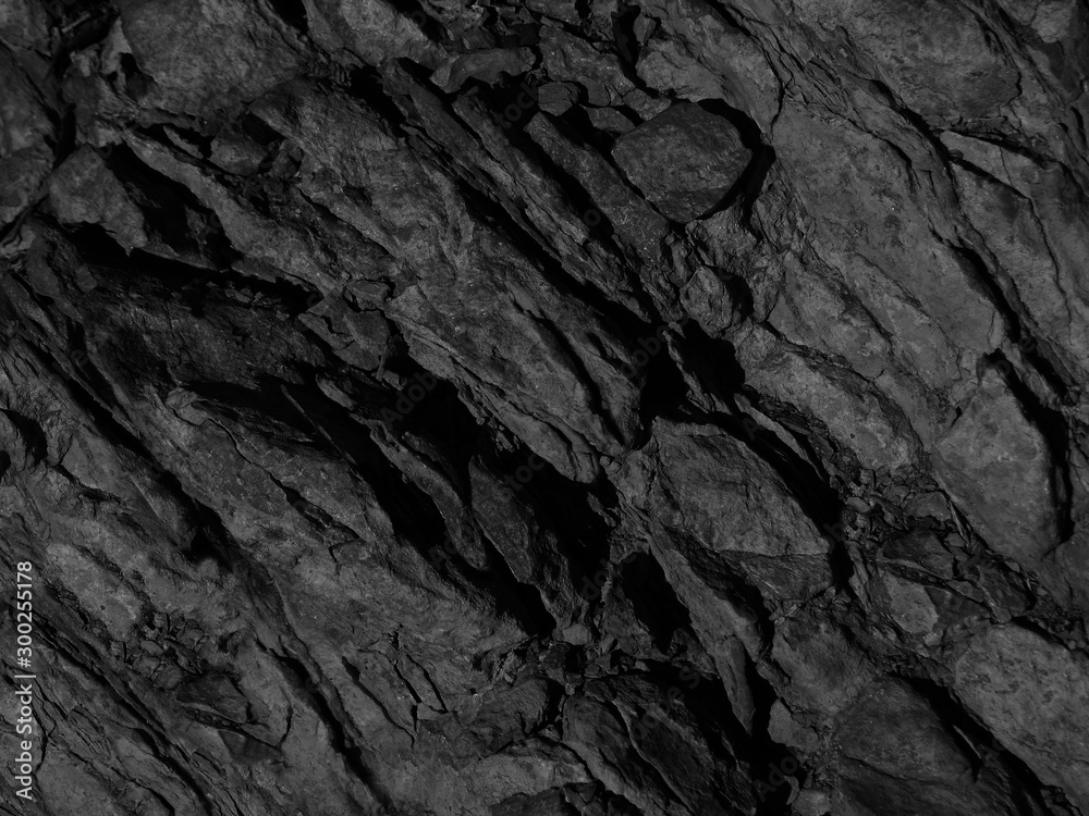 Black rock background. Dark gray stone grunge background. Rock texture. - obrazy, fototapety, plakaty 